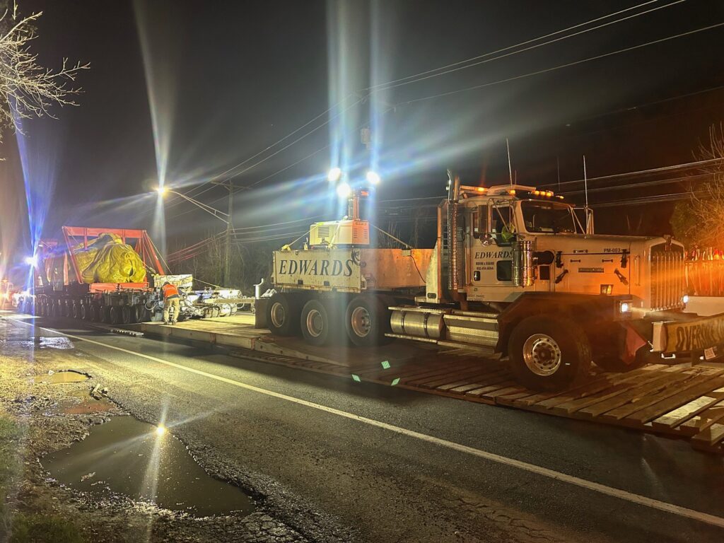 Night heavy haul movement of Hanuman statue under traffic control in Maryland