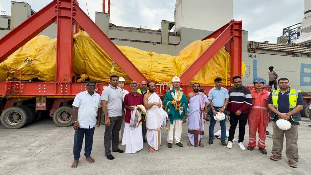 Temple team with Hanuman statue before ocean shipment from India to the USA