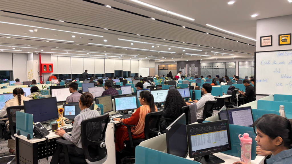 S&S Brokerage operations team coordinating freight and logistics from the office
